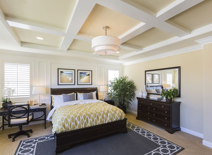 Showcasing a bedroom with ceiling, crown, and picture moulding.